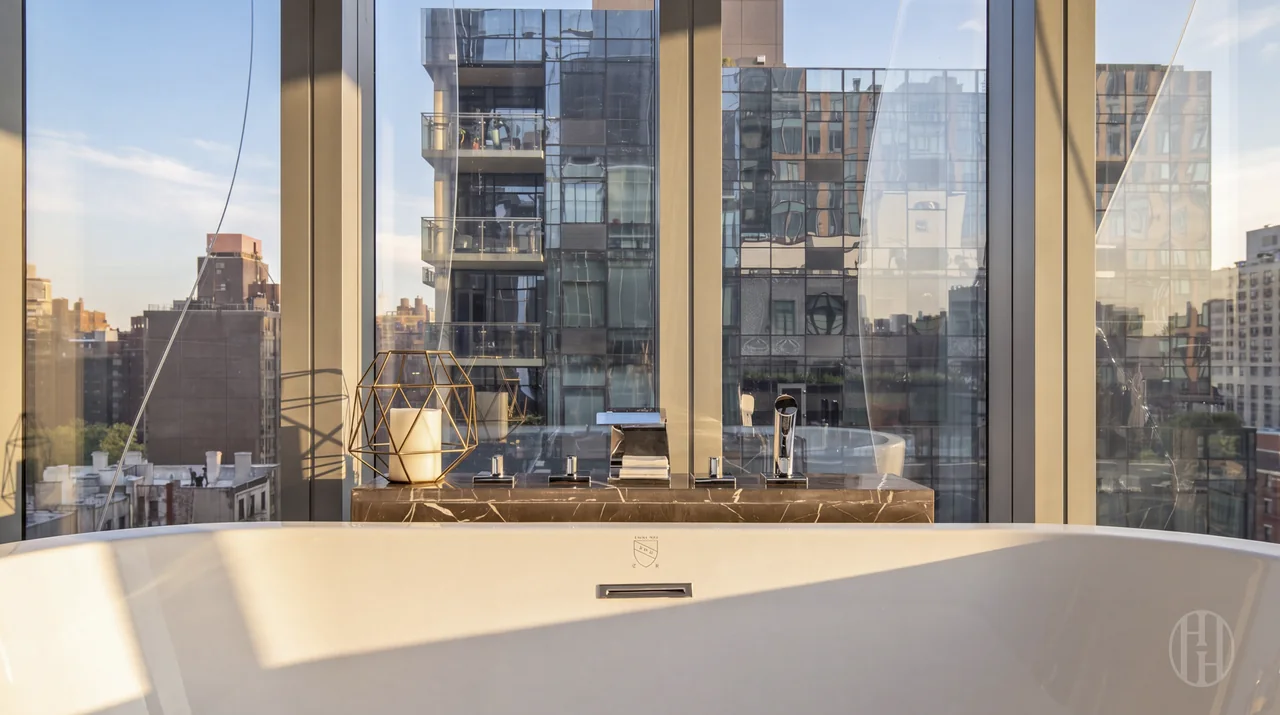 Soaking tub and skyline view at 515 West 29th Street, Residence 9